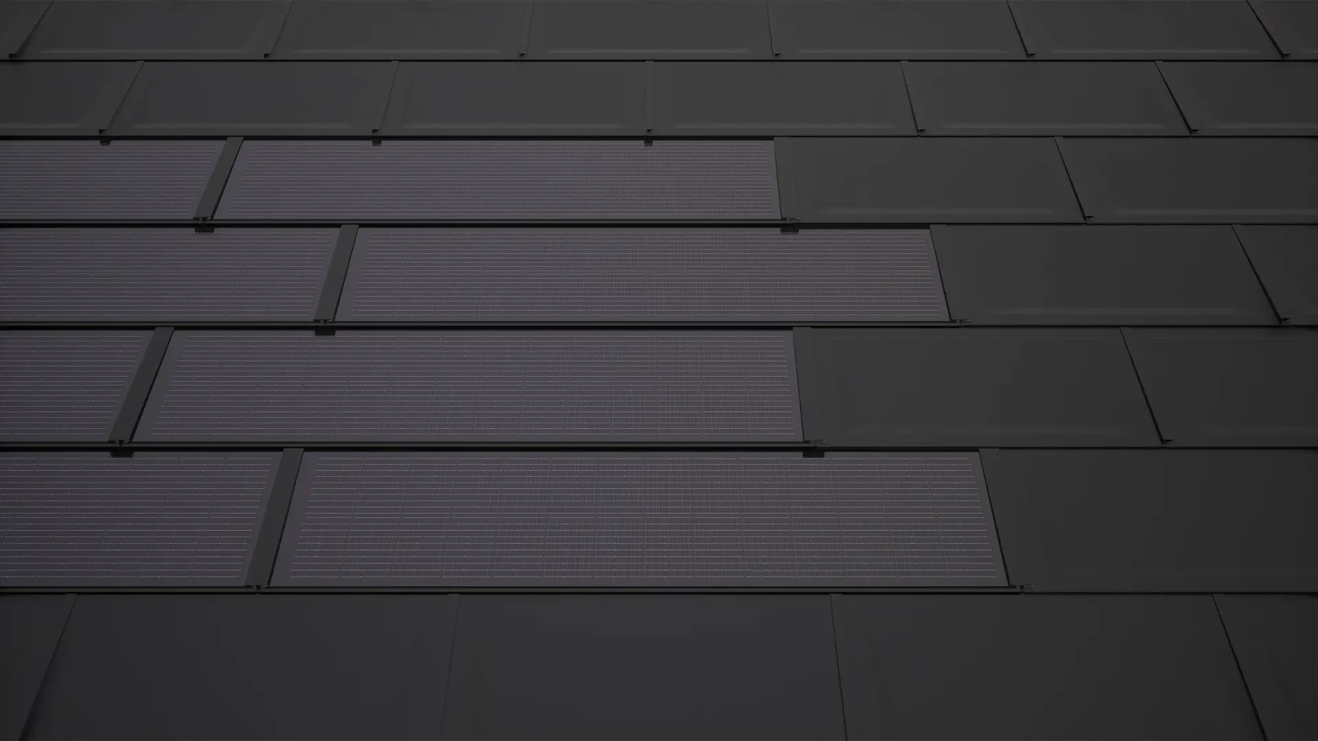 La photo montre des tuiles solaires PREFA noires, montées sur une toiture, combinées avec la tuile PREFA R.16. Les modules solaires sont disposés en rangées régulières.