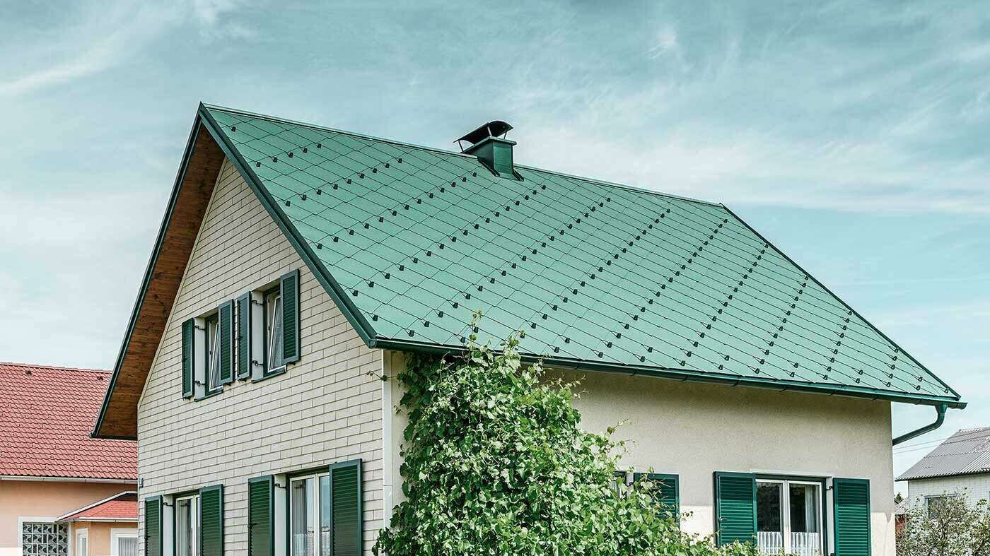 Maison individuelle rénovée avec  les losanges 44 × 44 en vert mousse
