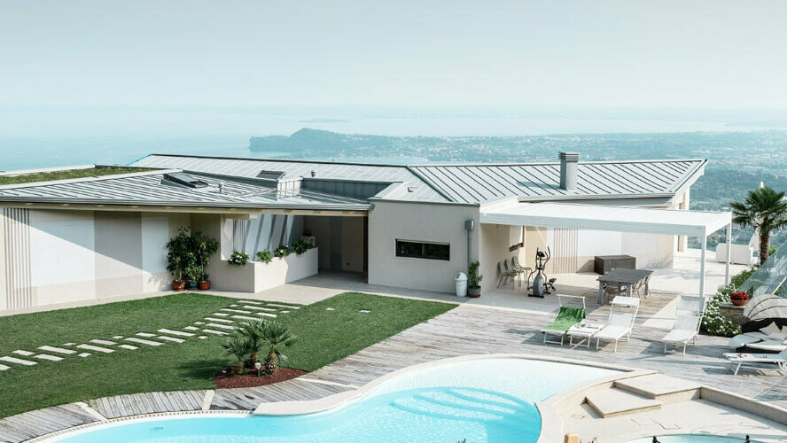 Bâtiment d’habitation avec piscine dans un cadre exceptionnel. Le toit plat du bâtiment moderne est couvert de Prefalz couleur gris quartz.