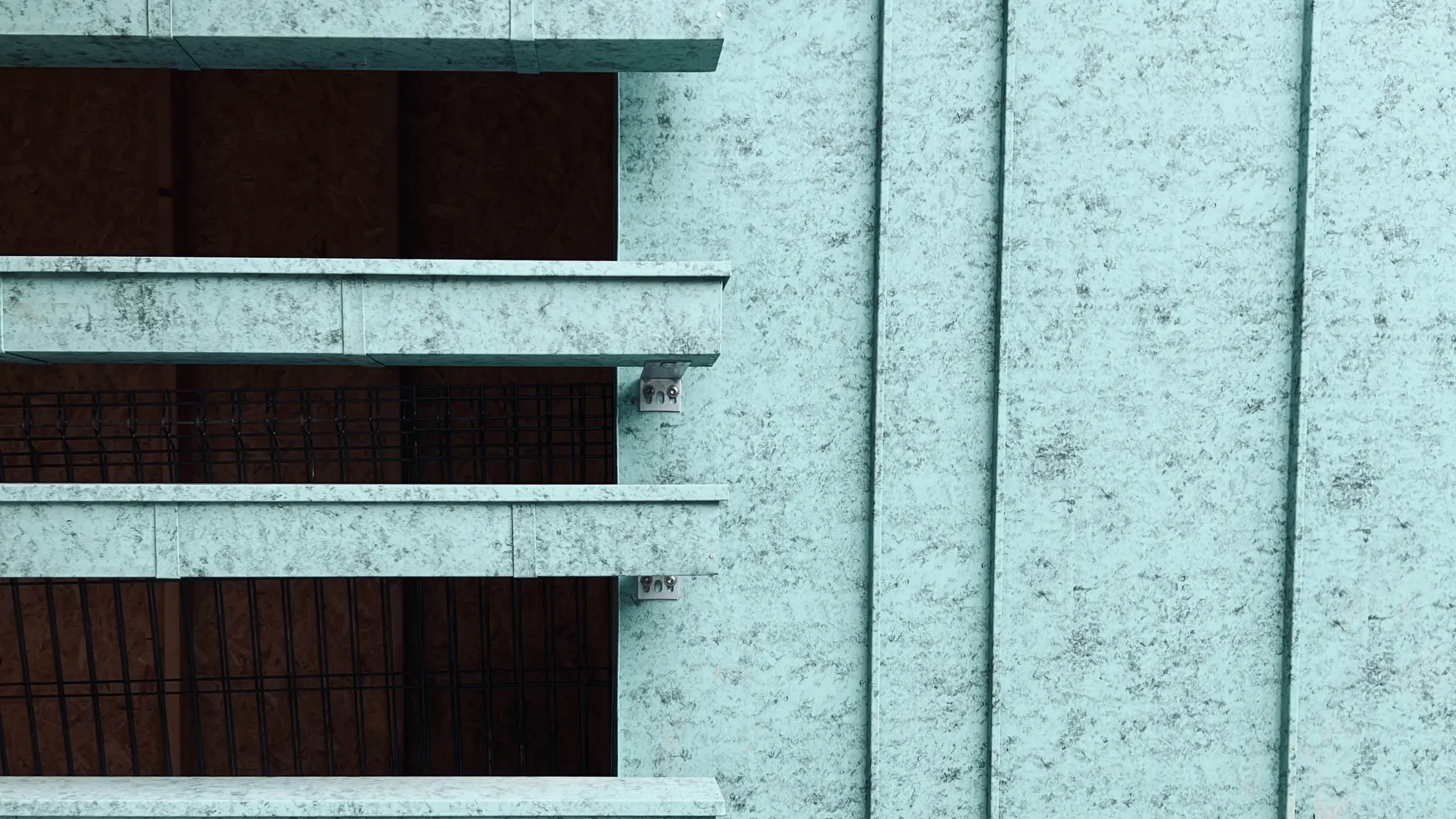 Zoom sur le système complet PREFA : l'aluminium dans la teinte P.10 vert-de-gris a été utilisé à la fois sur la façade, mais également pour réalisé des brise-soleil 