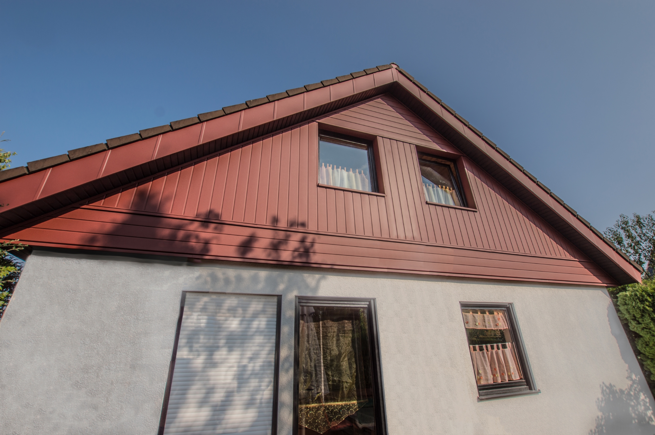 Bâtiments de référence PREFA Systèmes de façades Siding 05 P.10 rouge oxyde